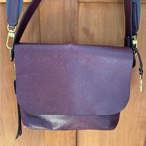 Burgundy Fossil leather purse.